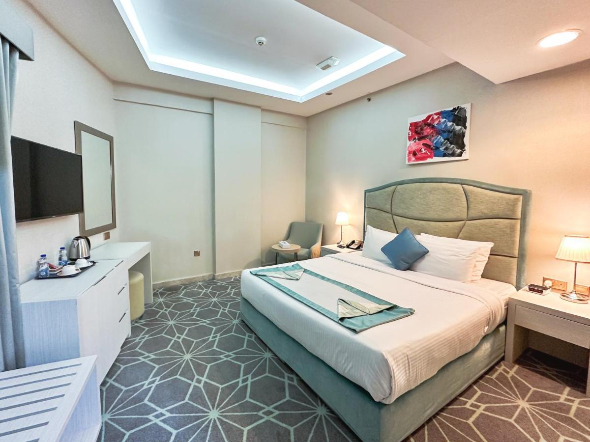 The Victory Hotel Doha Exterior foto